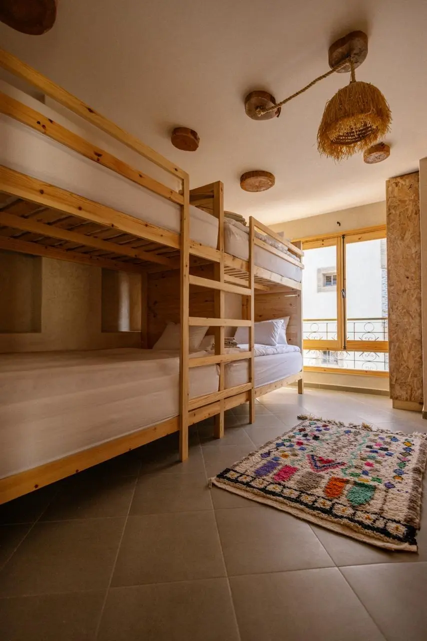 Shared room with wooden bunk beds
